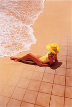Woman on warm floor at beach.